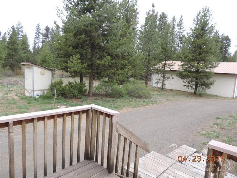 53255 Deep Woods Road La Pine, OR 97739 - Photo 12 of 25 Back Deck & stairway out to back yard