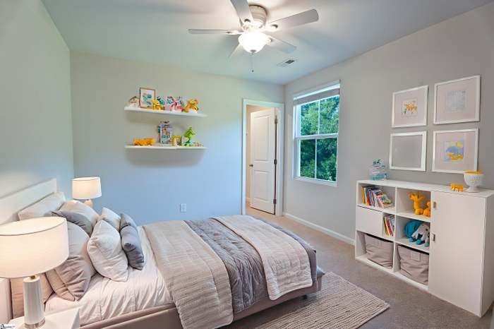 156 Queens Mill Court Pendleton, SC 29670 - Photo 8 of 18 This cozy bedroom provides a comfortable and inviting atmosphere, ideal for restful nights.