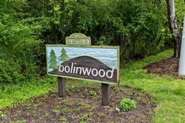a view of a street sign under an umbrella