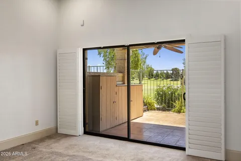 a view of a room with a large window