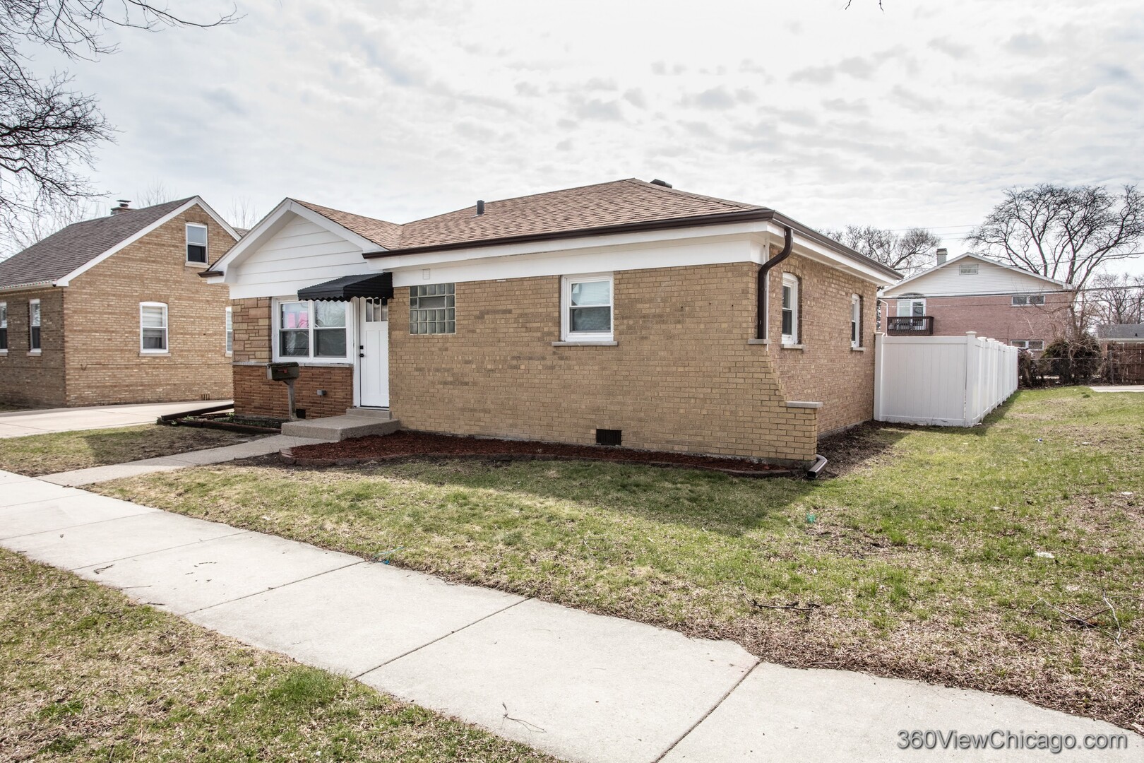 8651 44th Street Lyons, IL 60534 - Photo 2 of 31 a house view with a backyard space