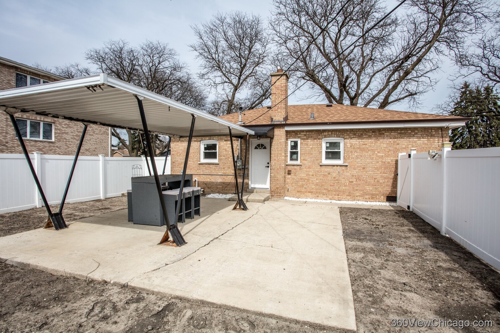 8651 44th Street Lyons, IL 60534 - Photo 23 of 31 a view of a house with backyard and sitting area
