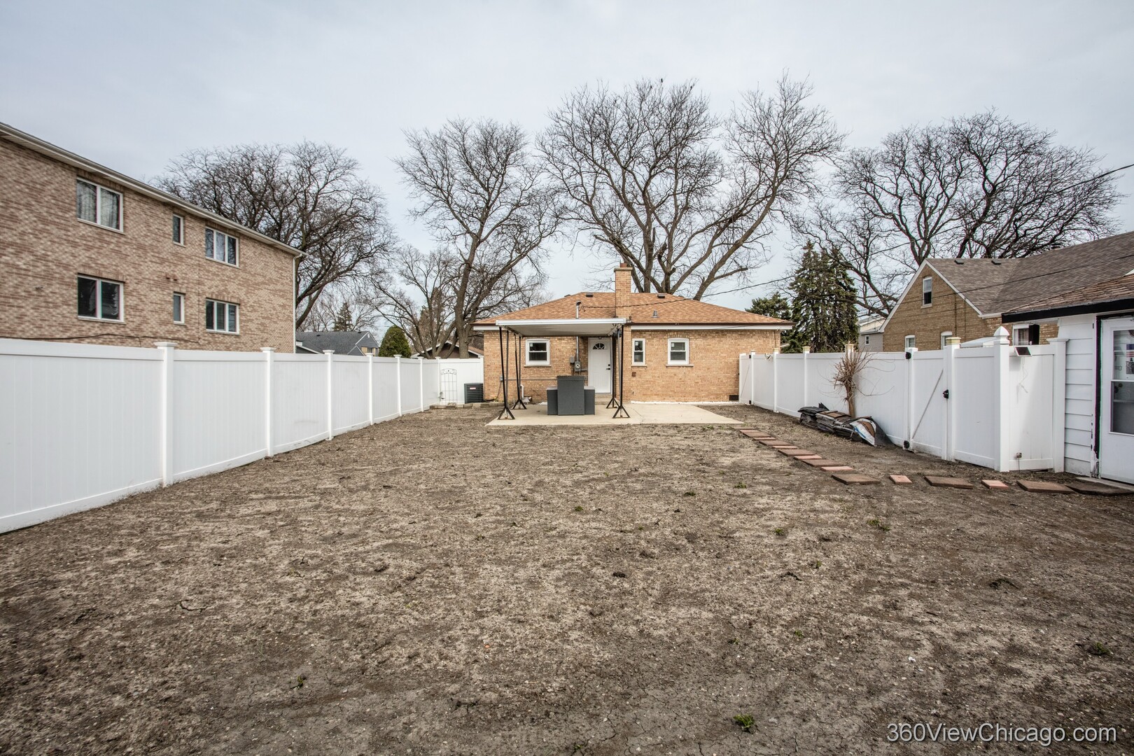 8651 44th Street Lyons, IL 60534 - Photo 27 of 31 front view of a house with a yard