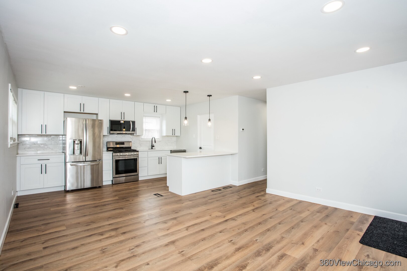 8651 44th Street Lyons, IL 60534 - Photo 6 of 31 a view of kitchen with wooden floor