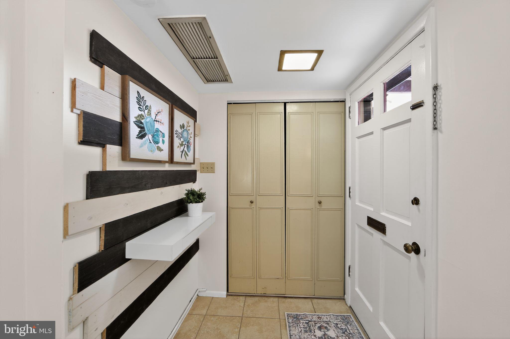 363 Old Forge Crossing, Unit 363 Devon, PA 19333 - Photo 7 of 32 Pretty front entrance with utility closet