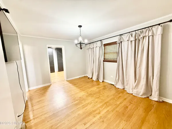 a view of a livingroom with a staircase