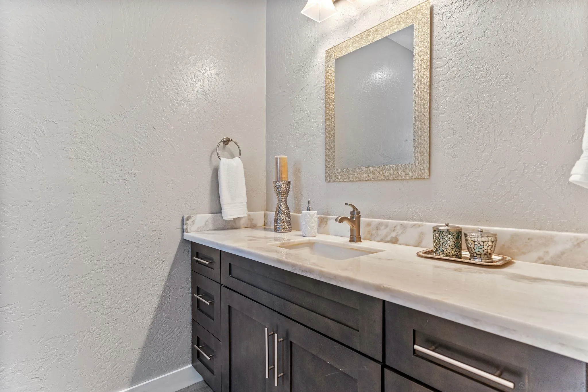 29575 Costalota Road Valley Center, CA 92082 - Photo 24 of 39 a bathroom with a sink and a mirror