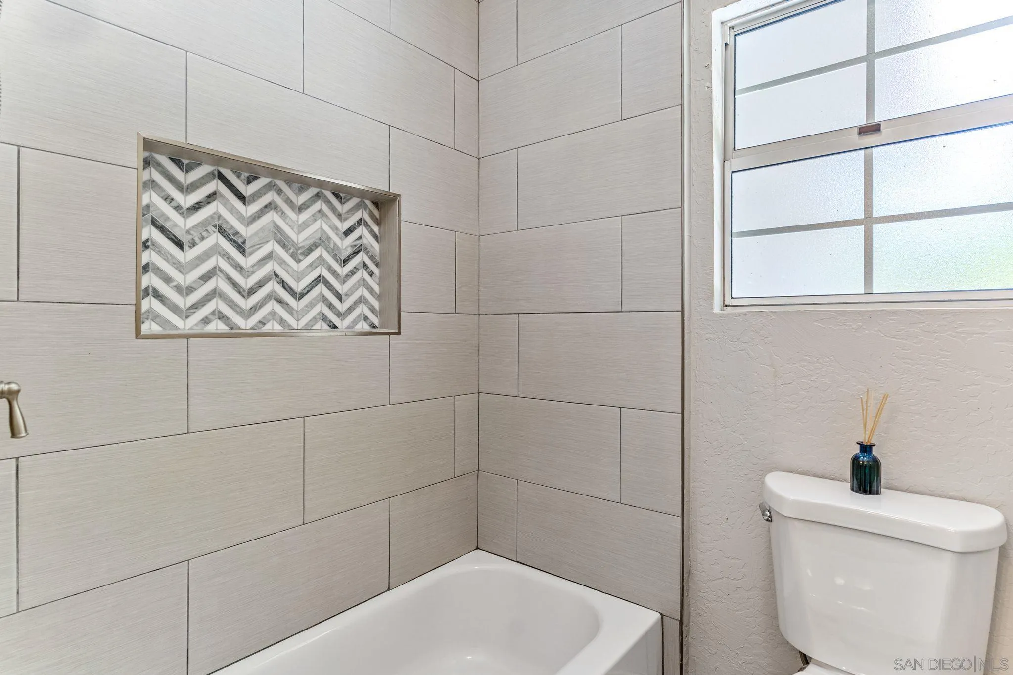 29575 Costalota Road Valley Center, CA 92082 - Photo 25 of 39 a bathroom with a toilet and a shower