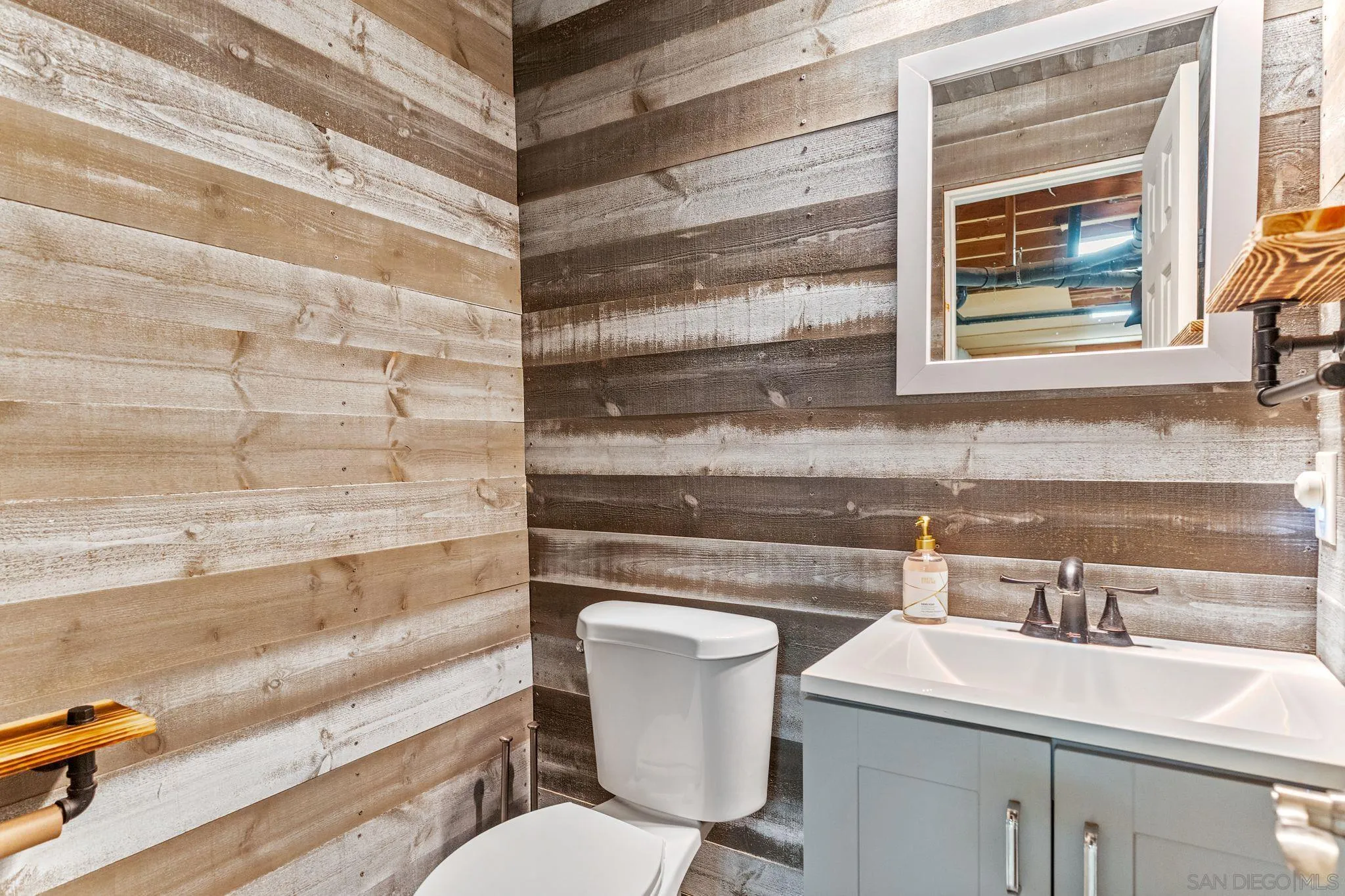 29575 Costalota Road Valley Center, CA 92082 - Photo 30 of 39 a bathroom with a sink and a toilet