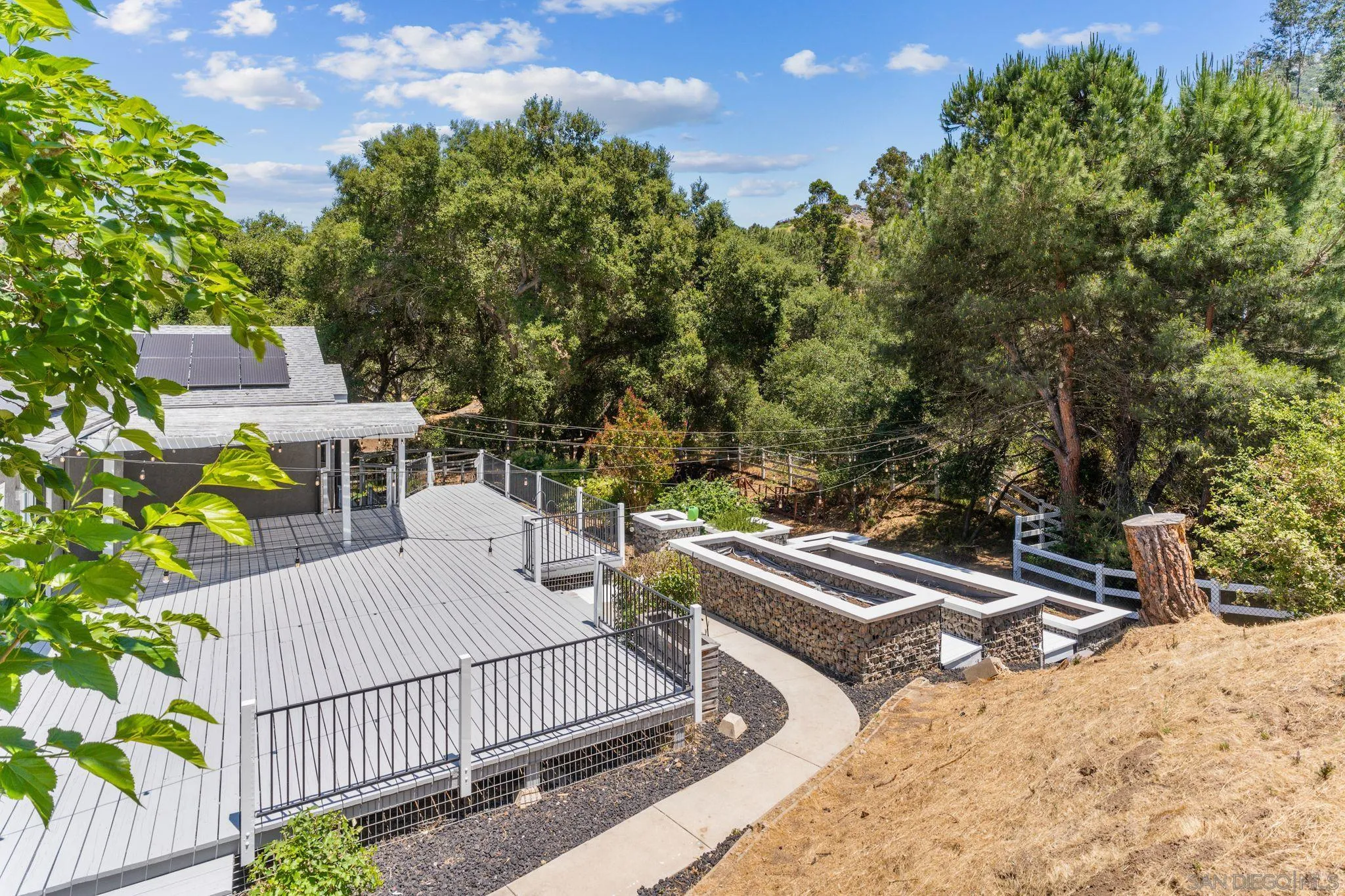 29575 Costalota Road Valley Center, CA 92082 - Photo 32 of 39 a view of a patio with two chairs and a table