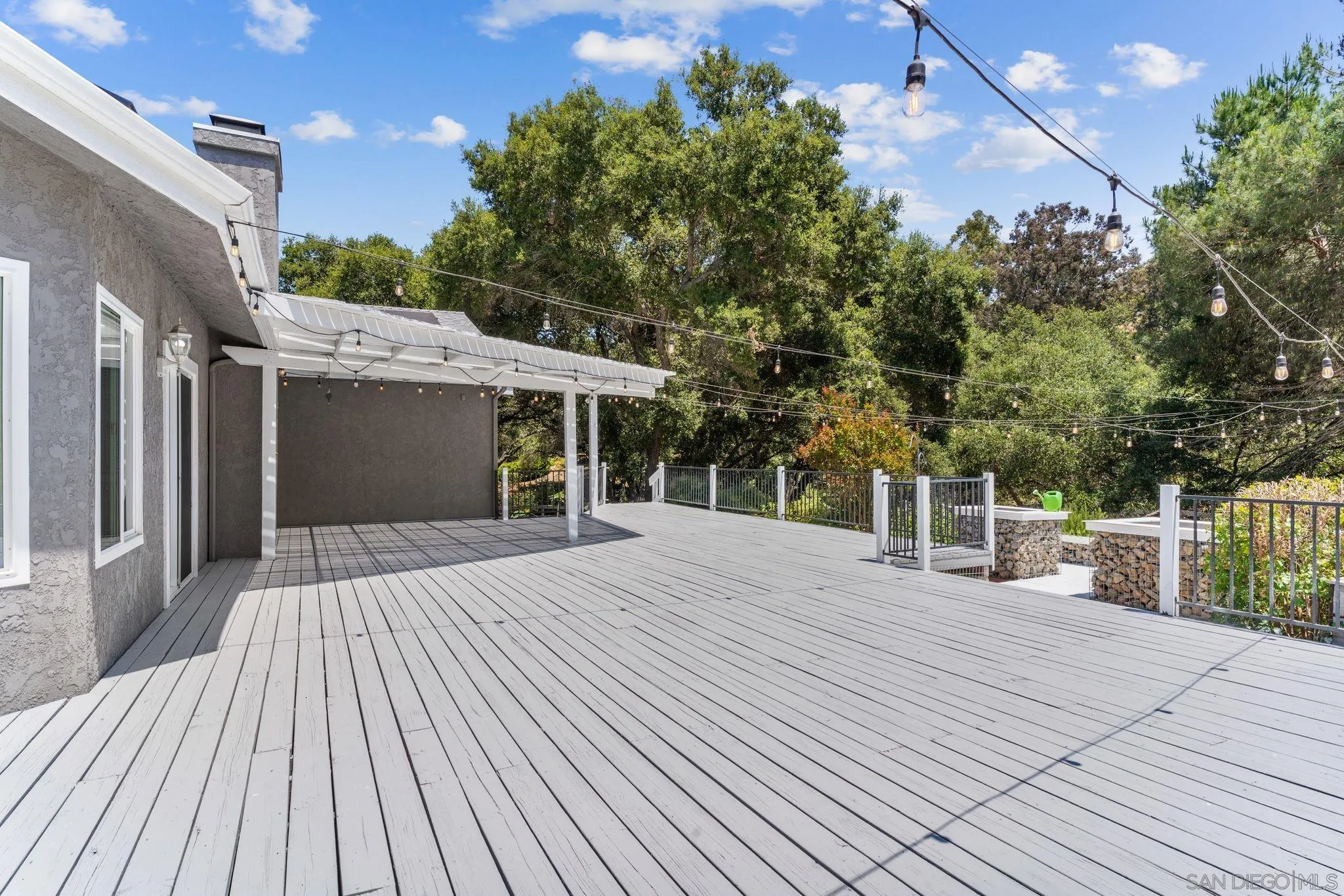 29575 Costalota Road Valley Center, CA 92082 - Photo 35 of 39 a view of a house with a roof deck