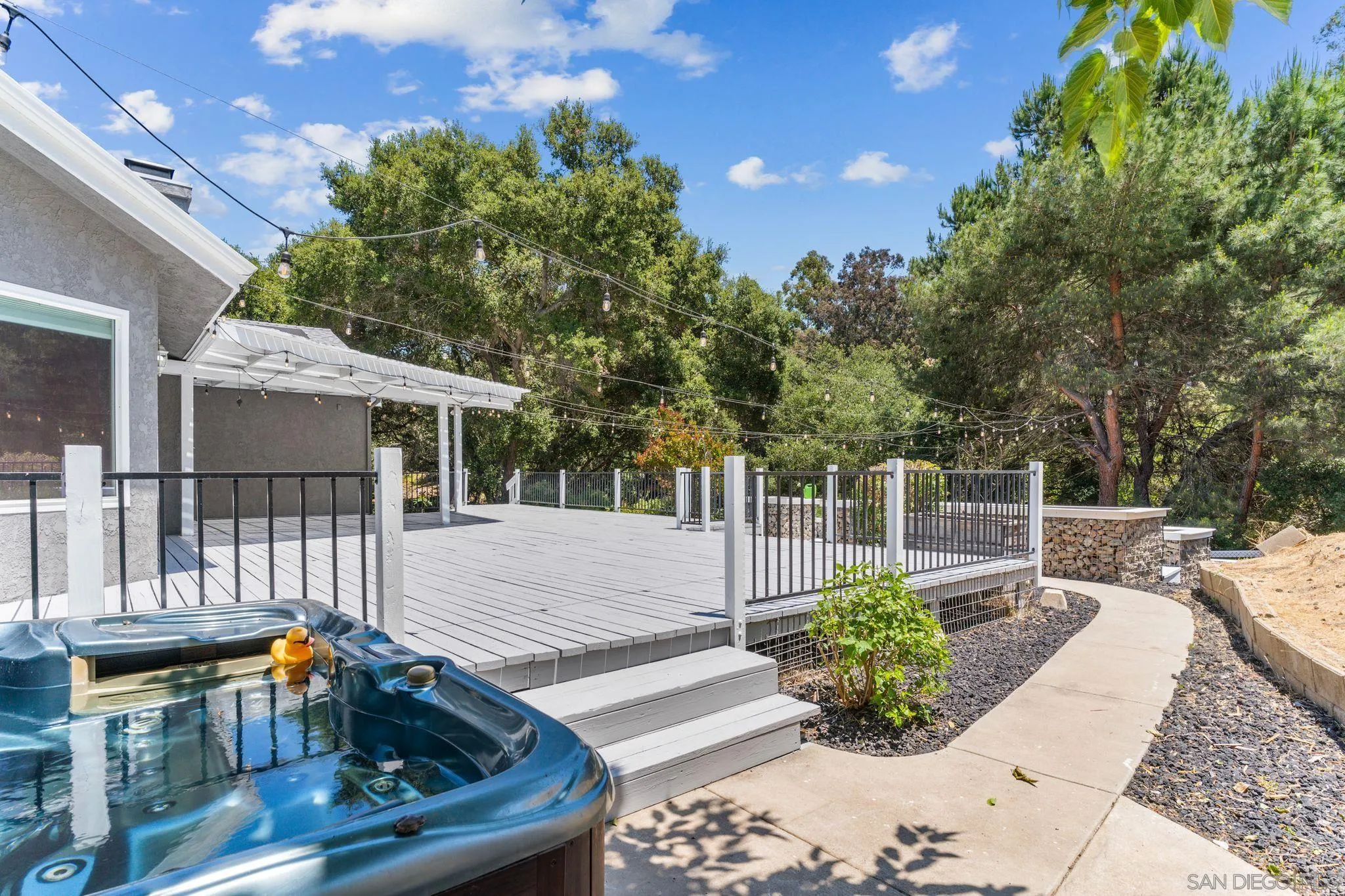 29575 Costalota Road Valley Center, CA 92082 - Photo 4 of 39 a view of a house with backyard and sitting area