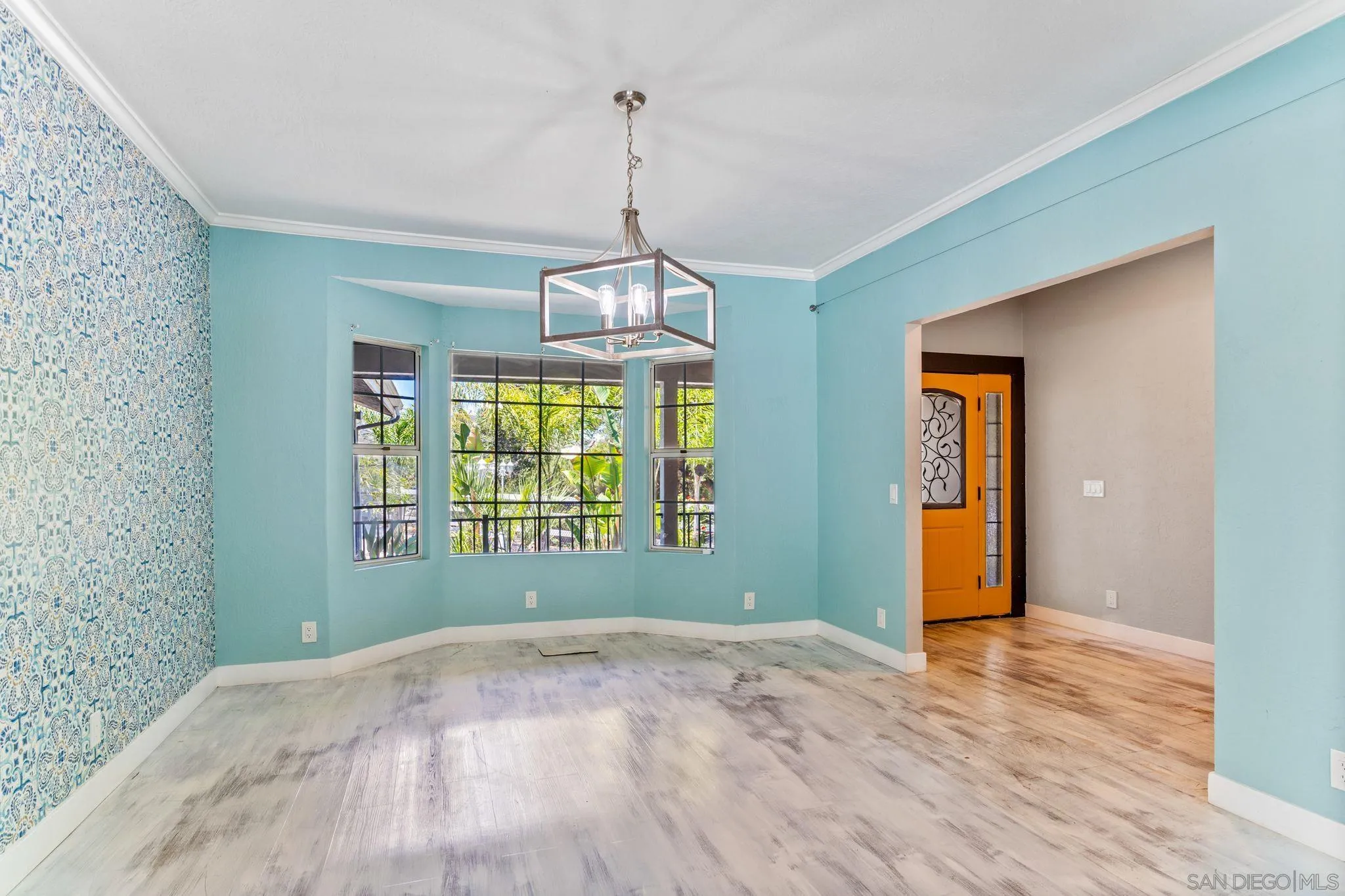 29575 Costalota Road Valley Center, CA 92082 - Photo 7 of 39 a view of empty room with wooden floor and fan