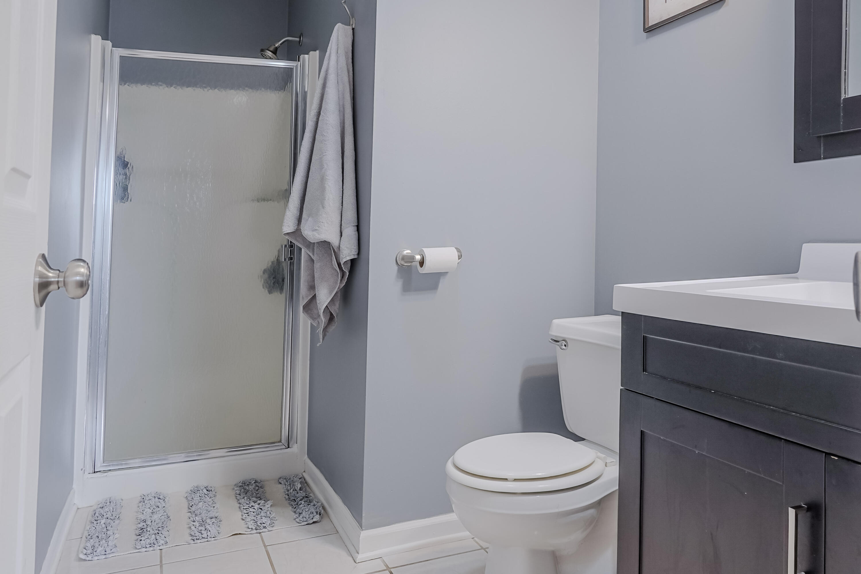 5065 Spinnaker Lane, Unit E Crown Point, IN 46307 - Photo 21 of 43 a bathroom with a sink and toilet