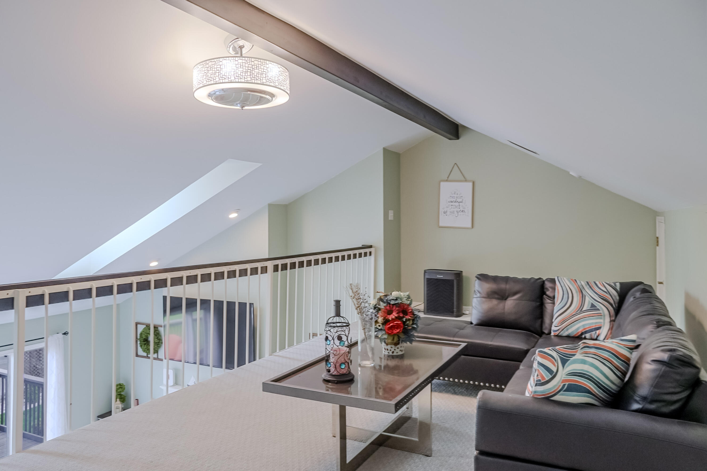 5065 Spinnaker Lane, Unit E Crown Point, IN 46307 - Photo 23 of 43 a living room with furniture and stairs