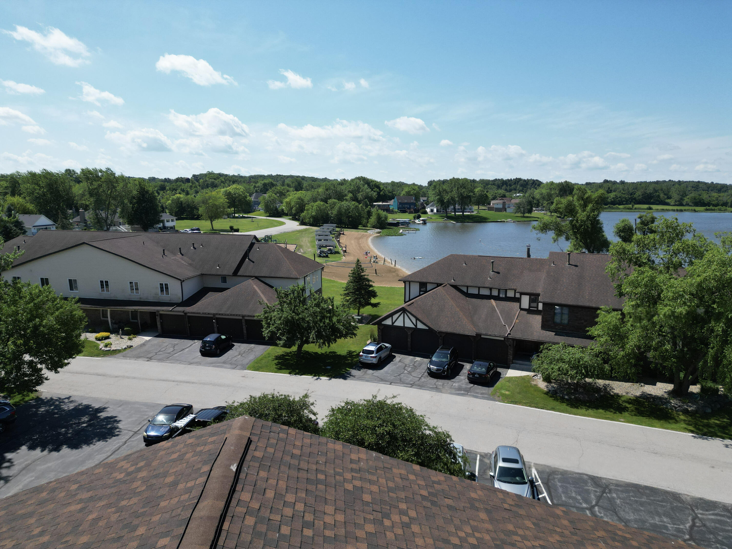 5065 Spinnaker Lane, Unit E Crown Point, IN 46307 - Photo 29 of 43 an aerial view of a house with a garden