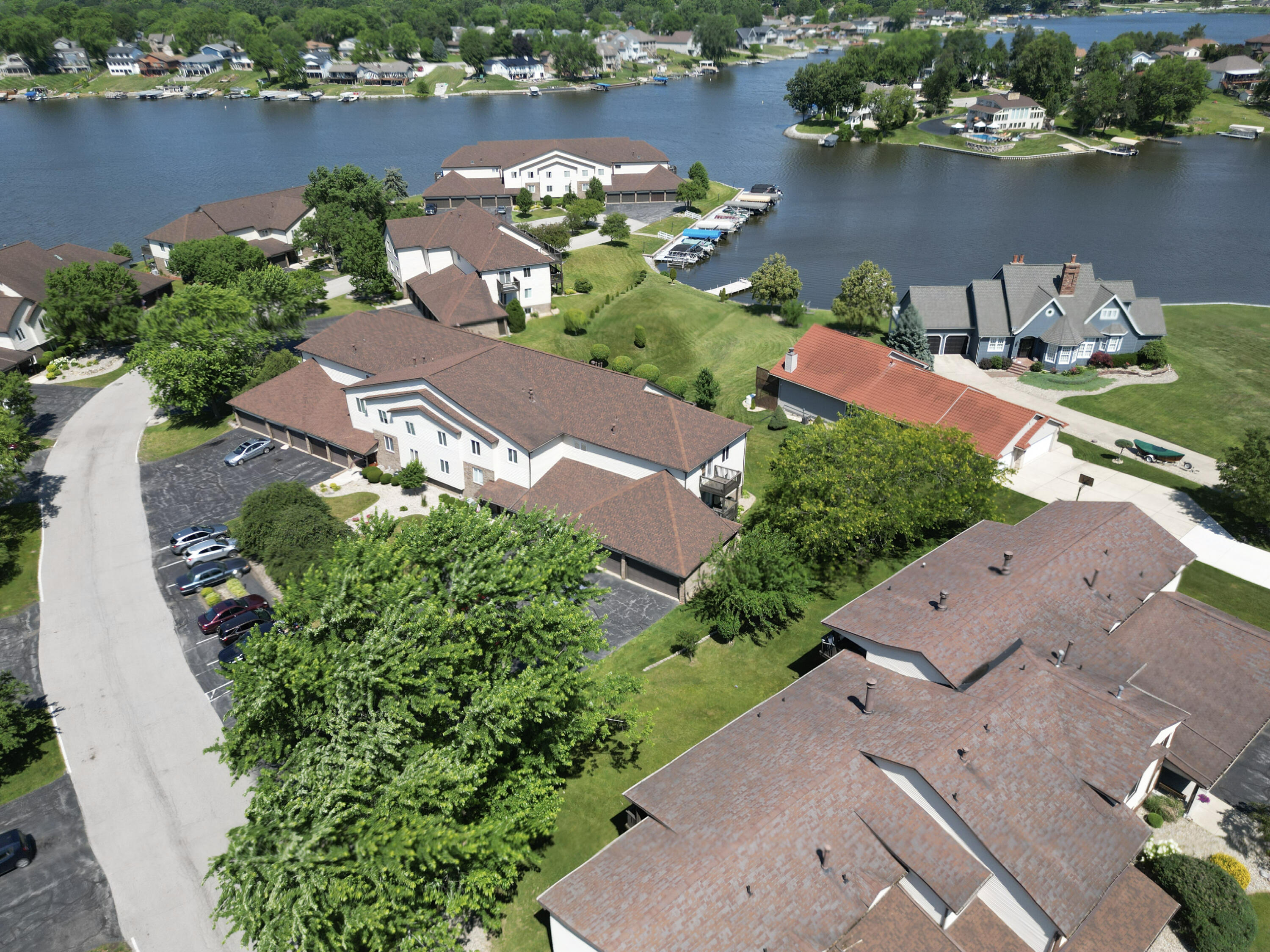 5065 Spinnaker Lane, Unit E Crown Point, IN 46307 - Photo 30 of 43 an aerial view of a house with a lake view