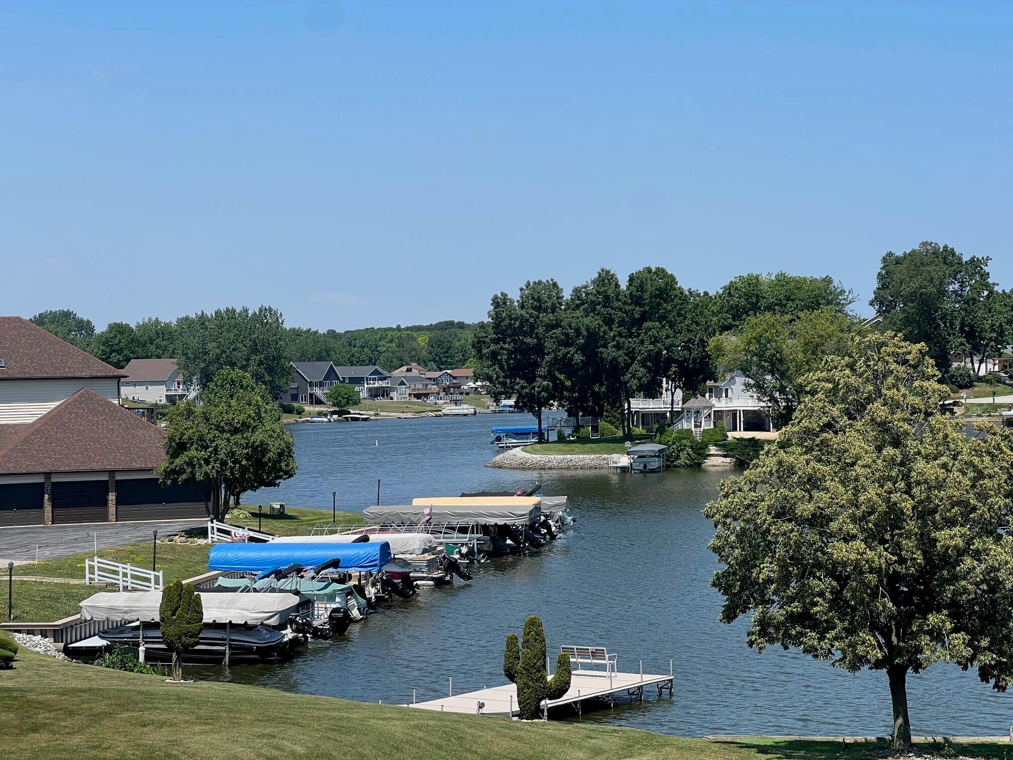 5065 Spinnaker Lane, Unit E Crown Point, IN 46307 - Photo 31 of 43 a couple of boats are docked in a harbor