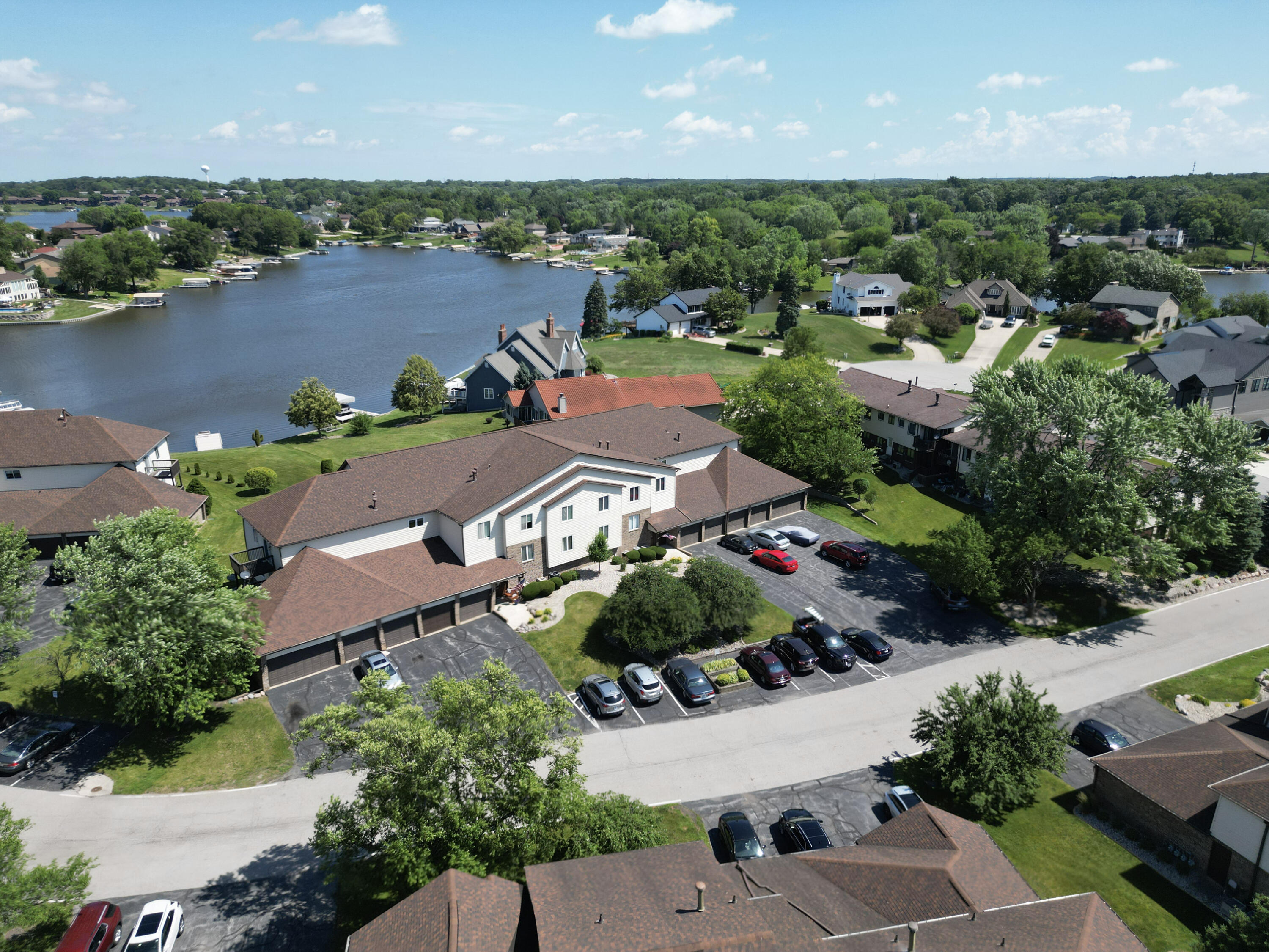 5065 Spinnaker Lane, Unit E Crown Point, IN 46307 - Photo 6 of 43 an aerial view of a house with a lake view