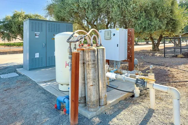 a view of a wooden house with a outdoor space