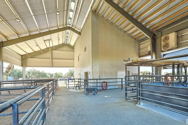 a view of an empty room with windows