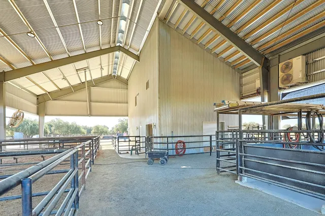 a view of an empty room with windows