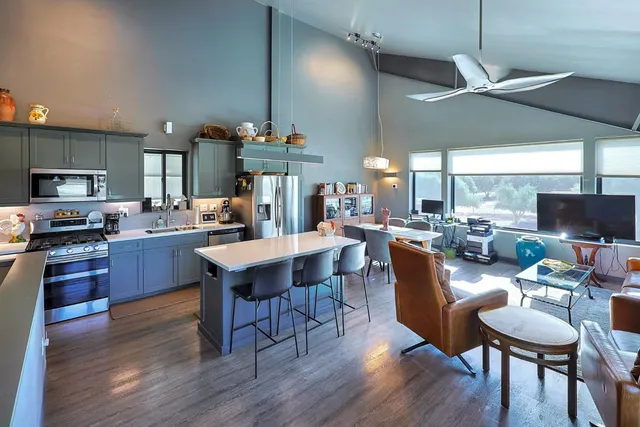 a kitchen with a stove and a microwave