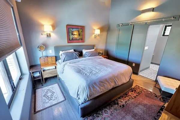a bathroom with a sink double vanity and a mirror
