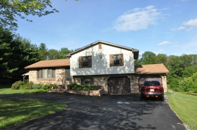 3532 High Hill Road Effort, PA 18330 - Photo 1 of 24 a front view of a house with garden