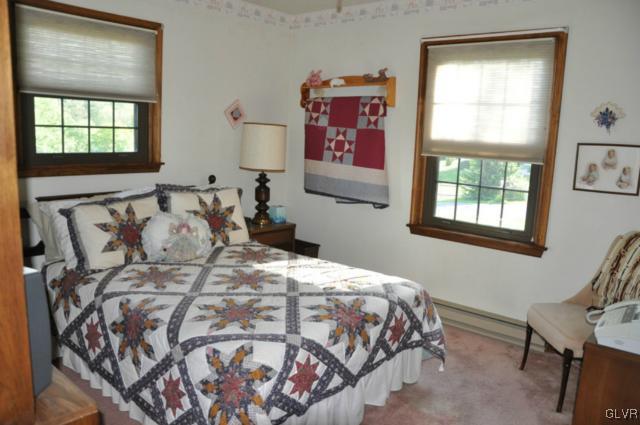3532 High Hill Road Effort, PA 18330 - Photo 13 of 24 a bedroom with a bed and a window