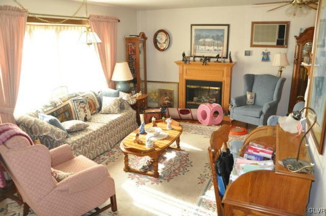 3532 High Hill Road Effort, PA 18330 - Photo 3 of 24 a living room with furniture and a fireplace