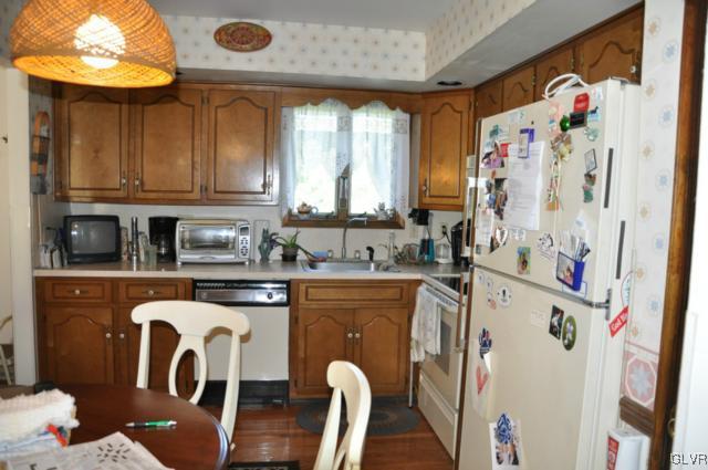 3532 High Hill Road Effort, PA 18330 - Photo 6 of 24 a kitchen with stainless steel appliances granite countertop a sink a stove a refrigerator and cabinets