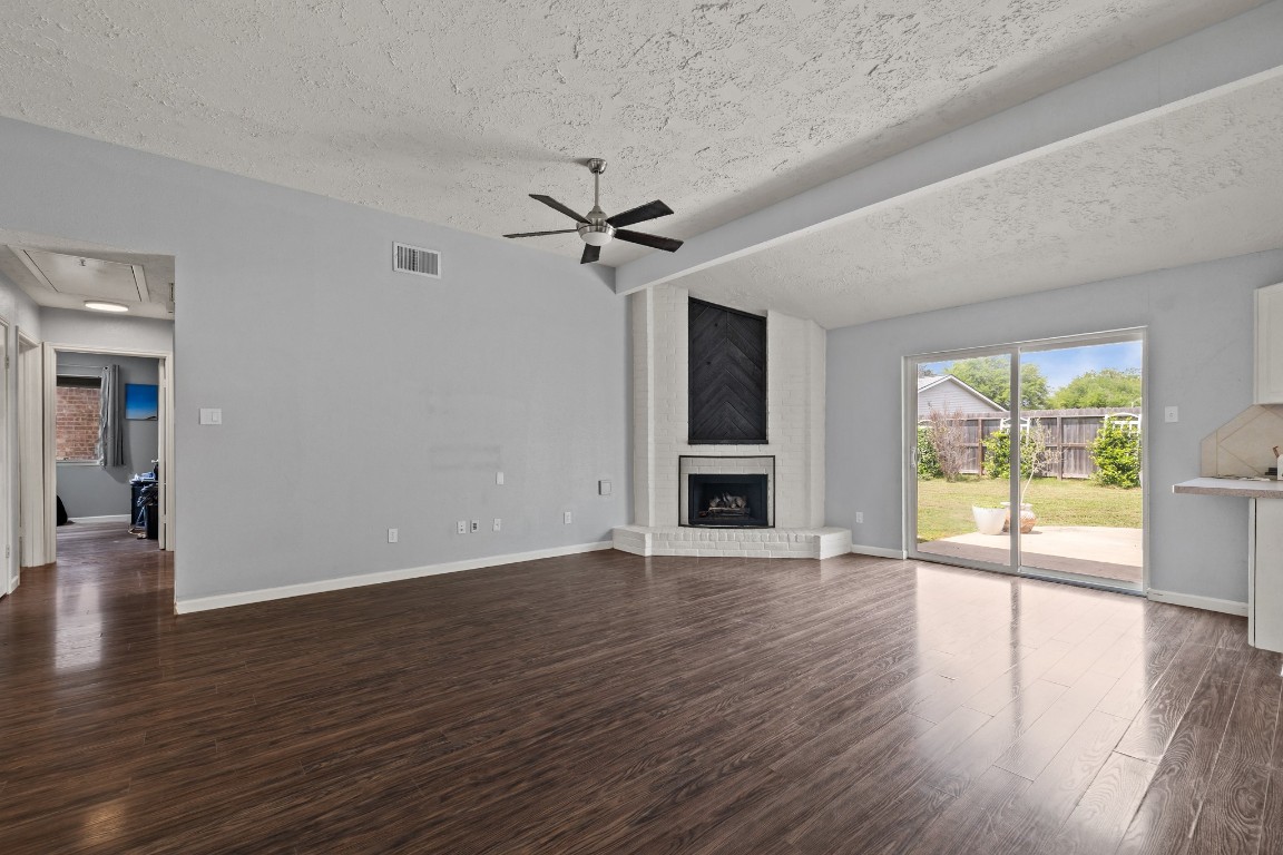 403 Buoy Road Houston, TX 77598 - Photo 6 of 22 Living Room view leading to three bedroom hallway