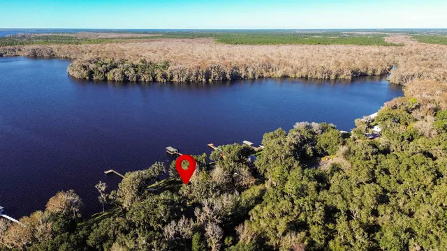 a view of a lake with a house
