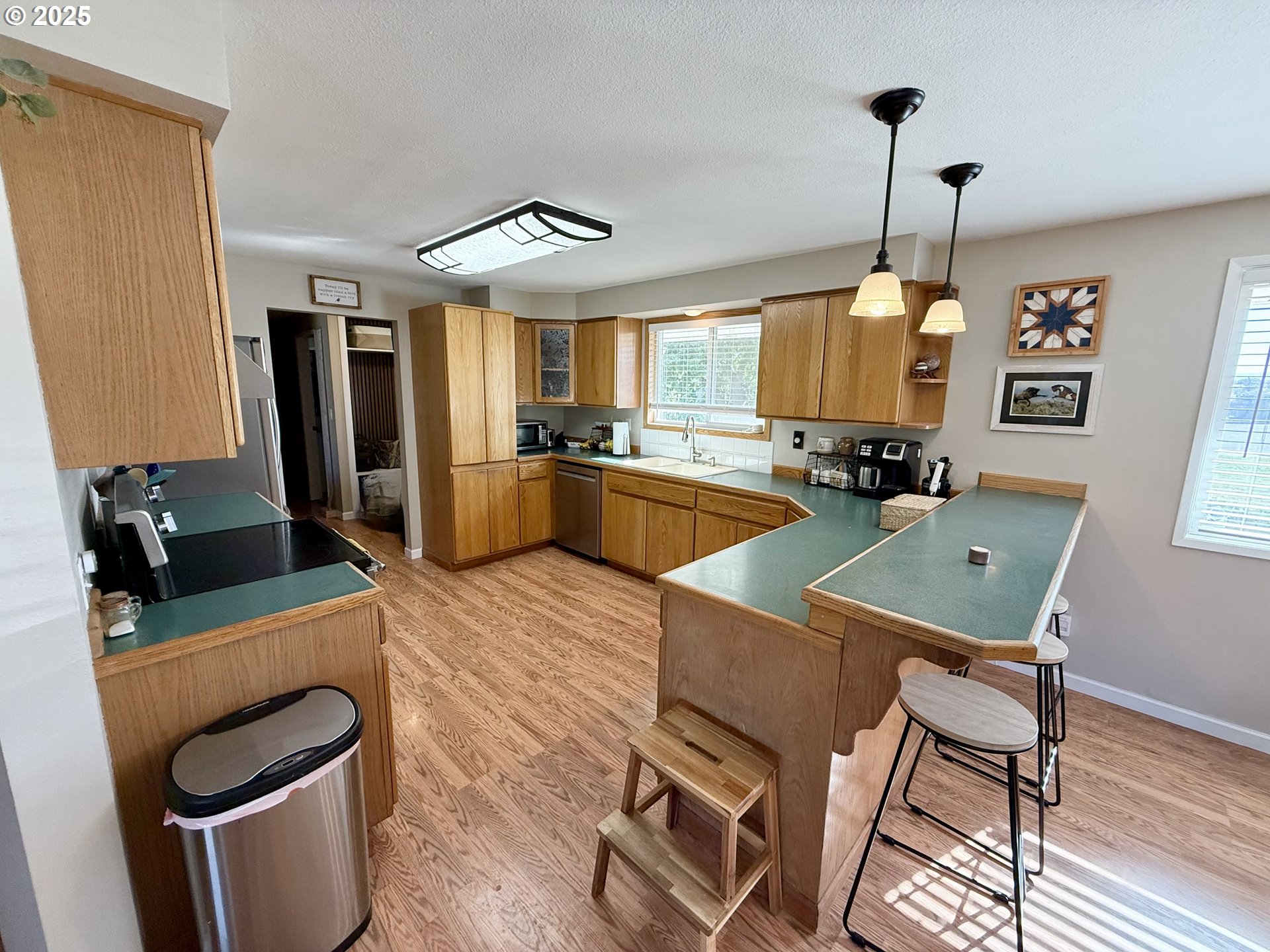 1317 Vita Court Pendleton, OR 97801 - Photo 16 of 32 a room with furniture a flat screen tv and a window