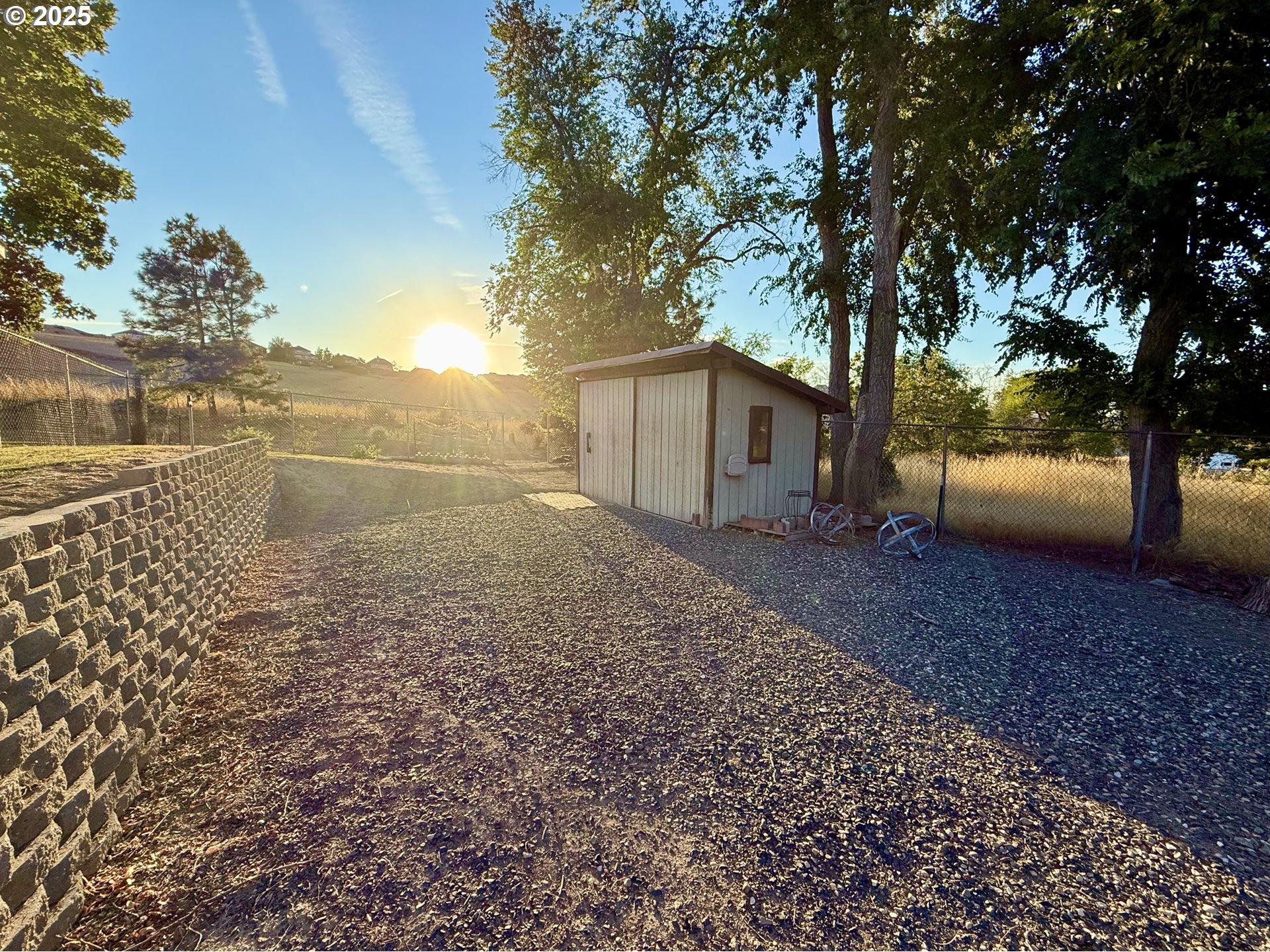 1317 Vita Court Pendleton, OR 97801 - Photo 3 of 32 a backyard of a house with lots of green space