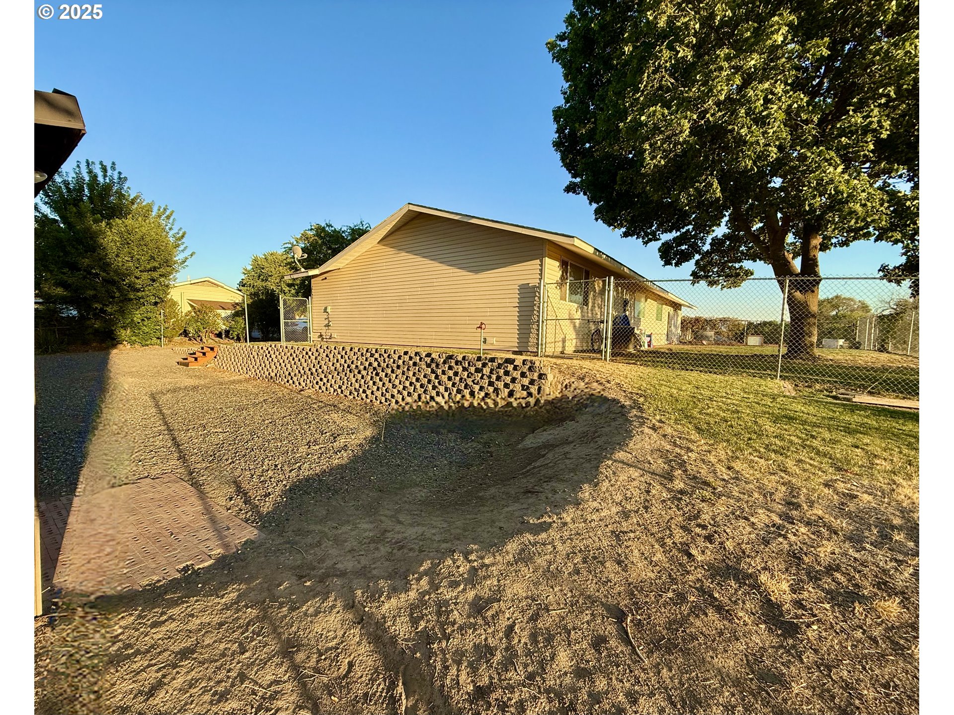 1317 Vita Court Pendleton, OR 97801 - Photo 7 of 32 a front view of a house with a yard
