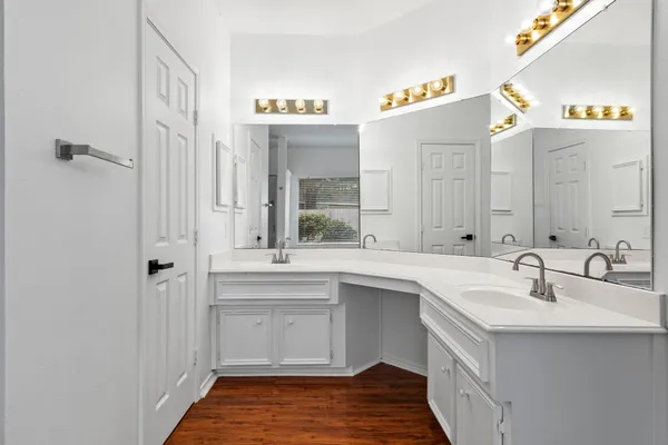 a bathroom with a bathtub and shower