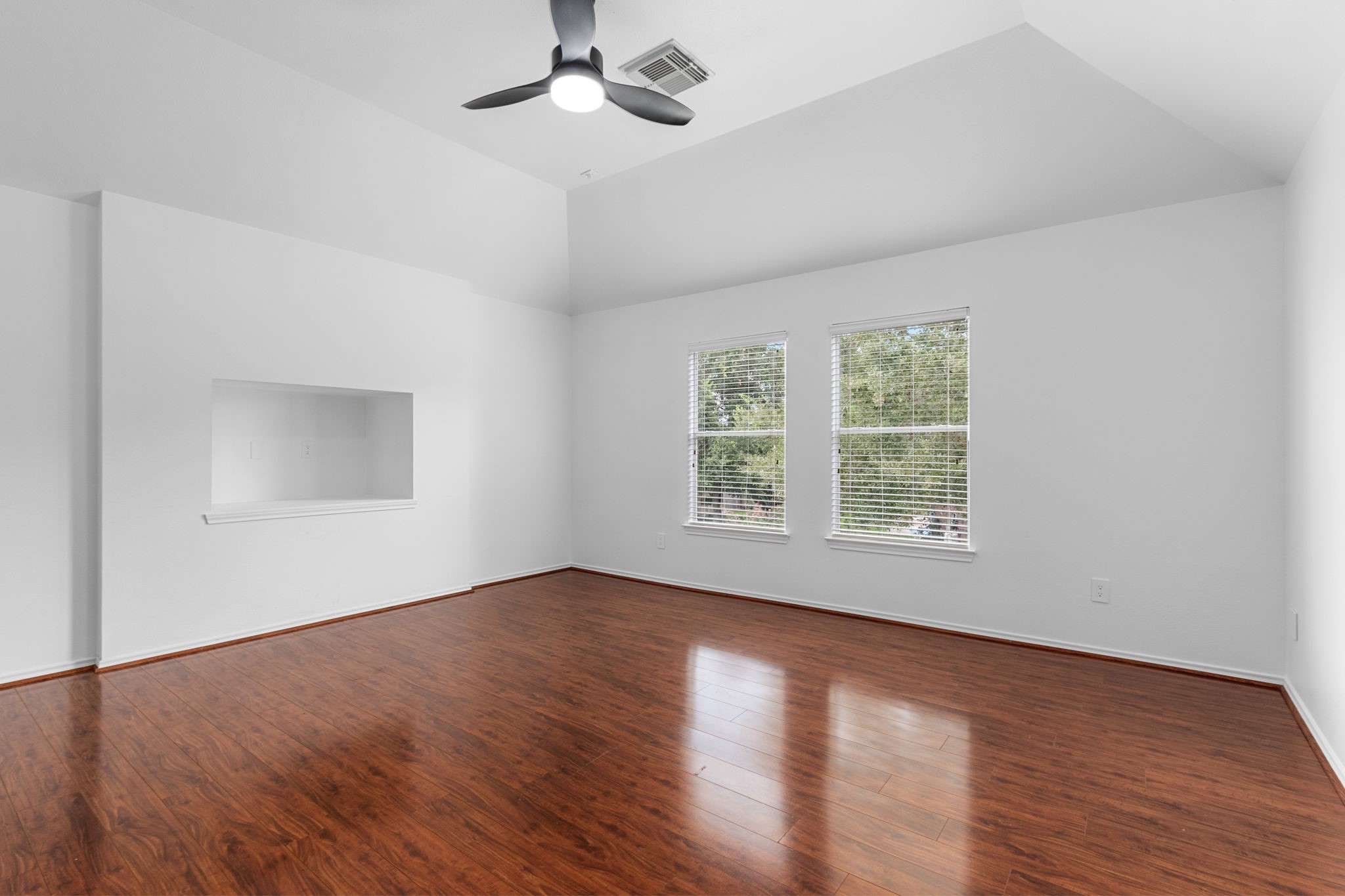 16202 Lasting Light Lane Houston, TX 77095 - Photo 23 of 36 a view of an empty room with wooden floor and a window