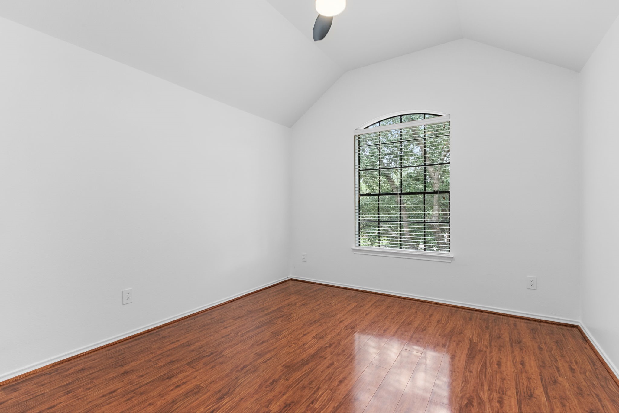 16202 Lasting Light Lane Houston, TX 77095 - Photo 27 of 36 an empty room with wooden floor and windows