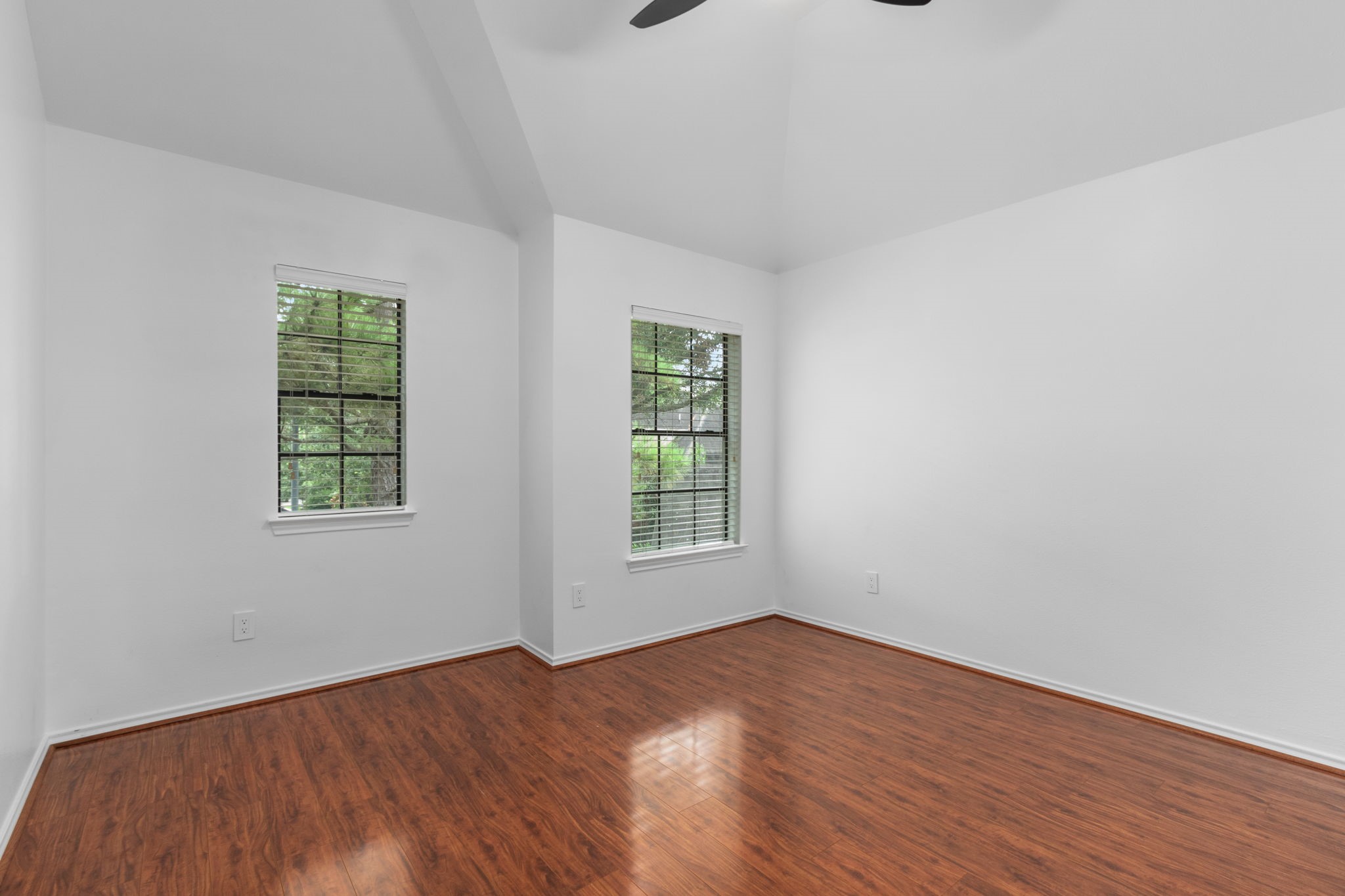 16202 Lasting Light Lane Houston, TX 77095 - Photo 28 of 36 an empty room with wooden floor and windows