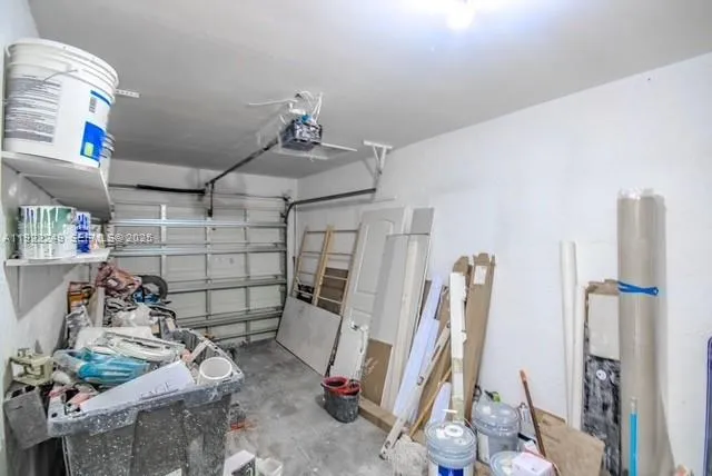 a bathroom with a sink a toilet a mirror and shower