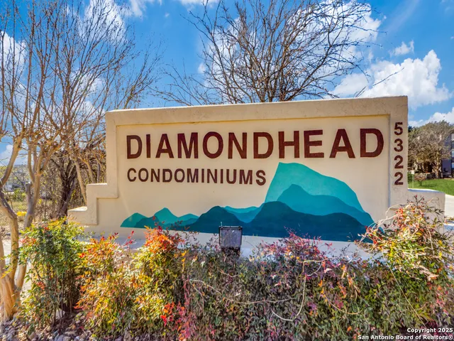 a sign that is on the wall of the building