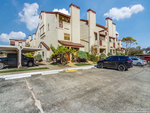 a car parked in front of a building