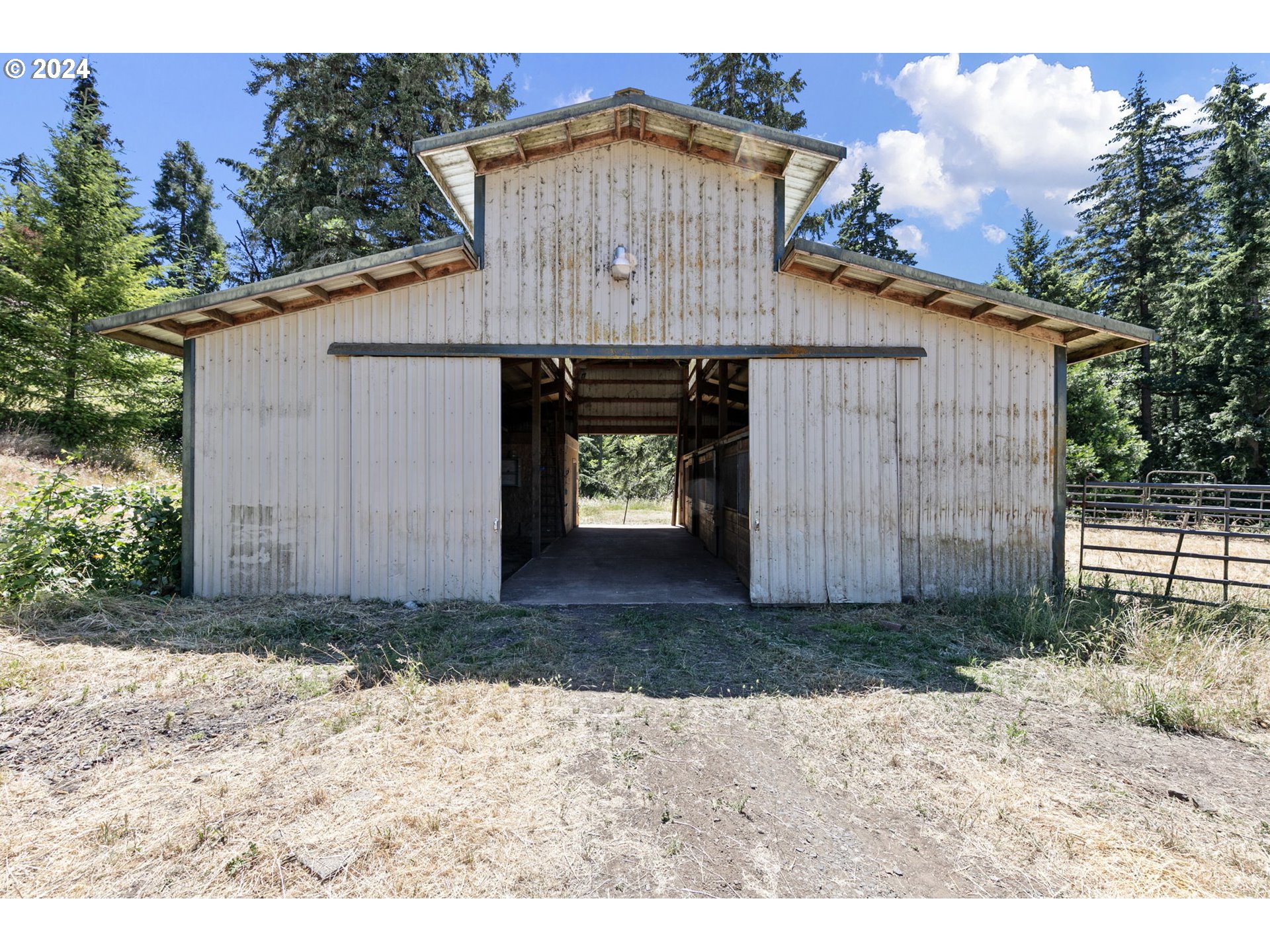 6551 Elkhead Road Yoncalla, OR 97499 - Photo 28 of 39 a front view of a house with a yard