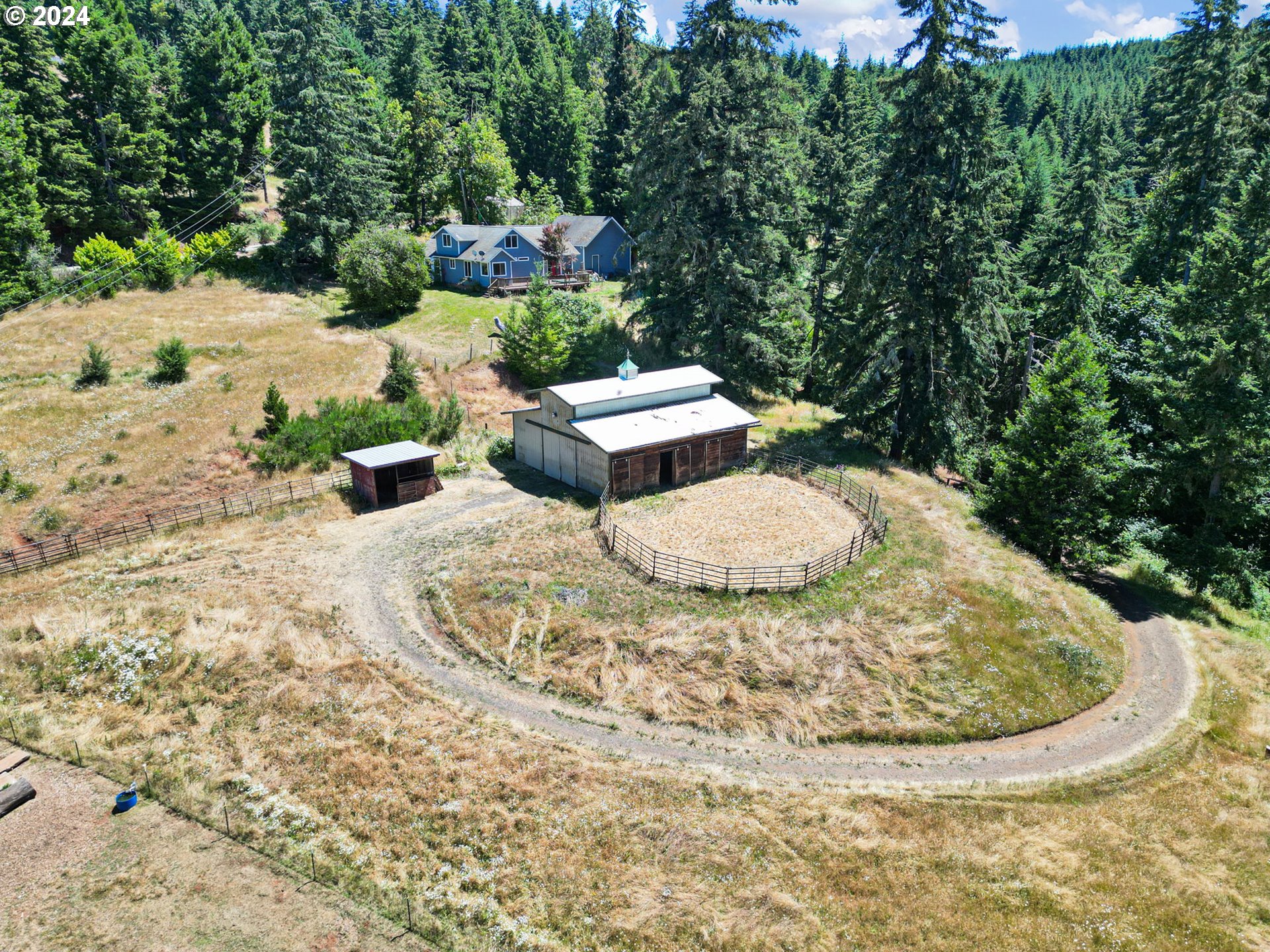 6551 Elkhead Road Yoncalla, OR 97499 - Photo 39 of 39 a view of a swimming pool with a yard