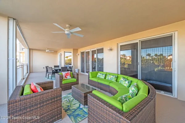 an aerial view of a house with a lake view