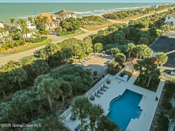 a view of city with ocean