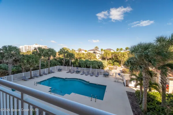 a view of a swimming pool and outdoor space