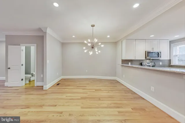 a view of a kitchen with marble kitchen and kitchen